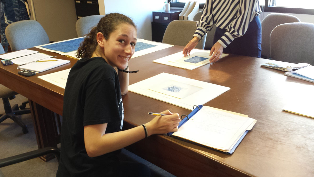 Clark University Student Rachel Polinsky works on Worcester Art Museum Cyanotypes