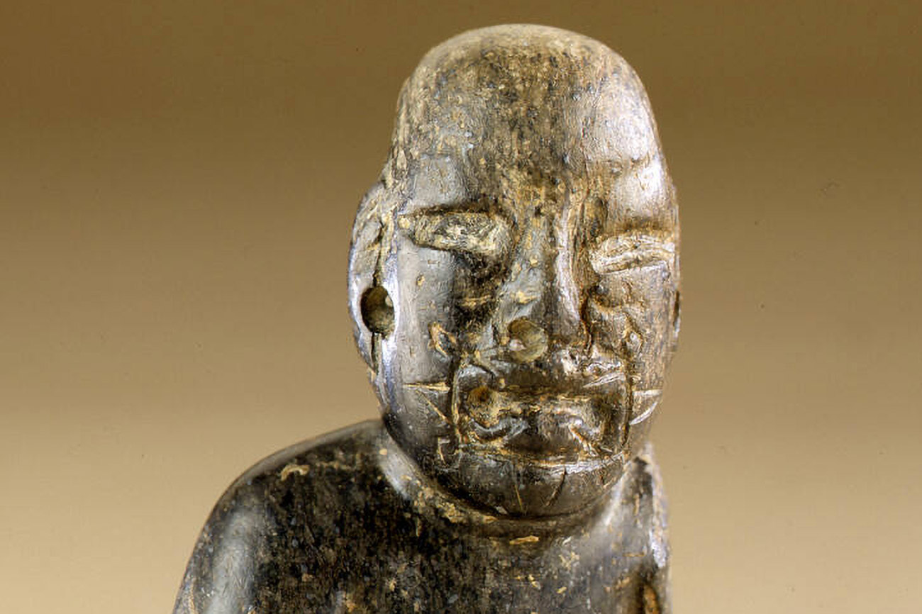 Olmec, 'Incised Standing Figure', detail, 800 BCE, dark green stone
