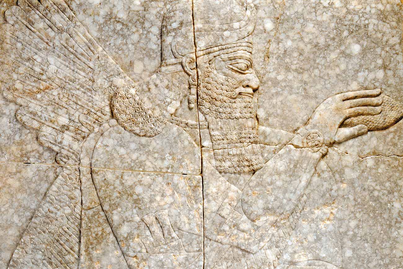 Assyrian (Nimrud), 'A Winged Genius', detail, 883–859 BCE, alabaster