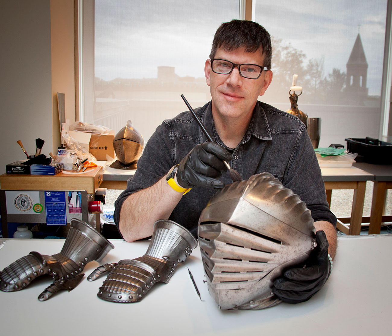 Arms and armor conservator Bill MacMillan at work