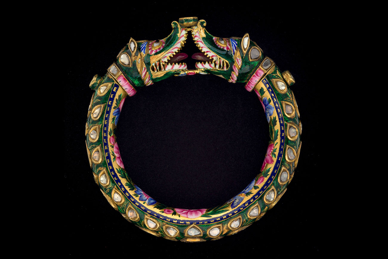 Probably Mughal, 'Gold Makara-Head Bracelet (kada)', early 1700s, gold with enamel work set in the kundun technique with diamonds and rubies