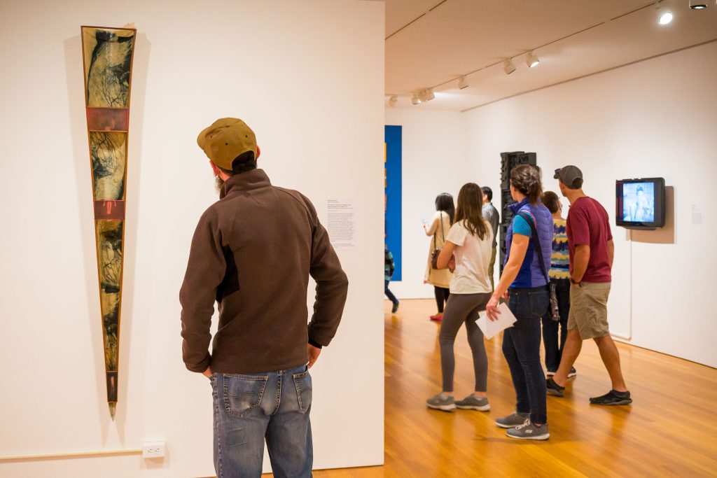 Guests exploring a contemporary art gallery