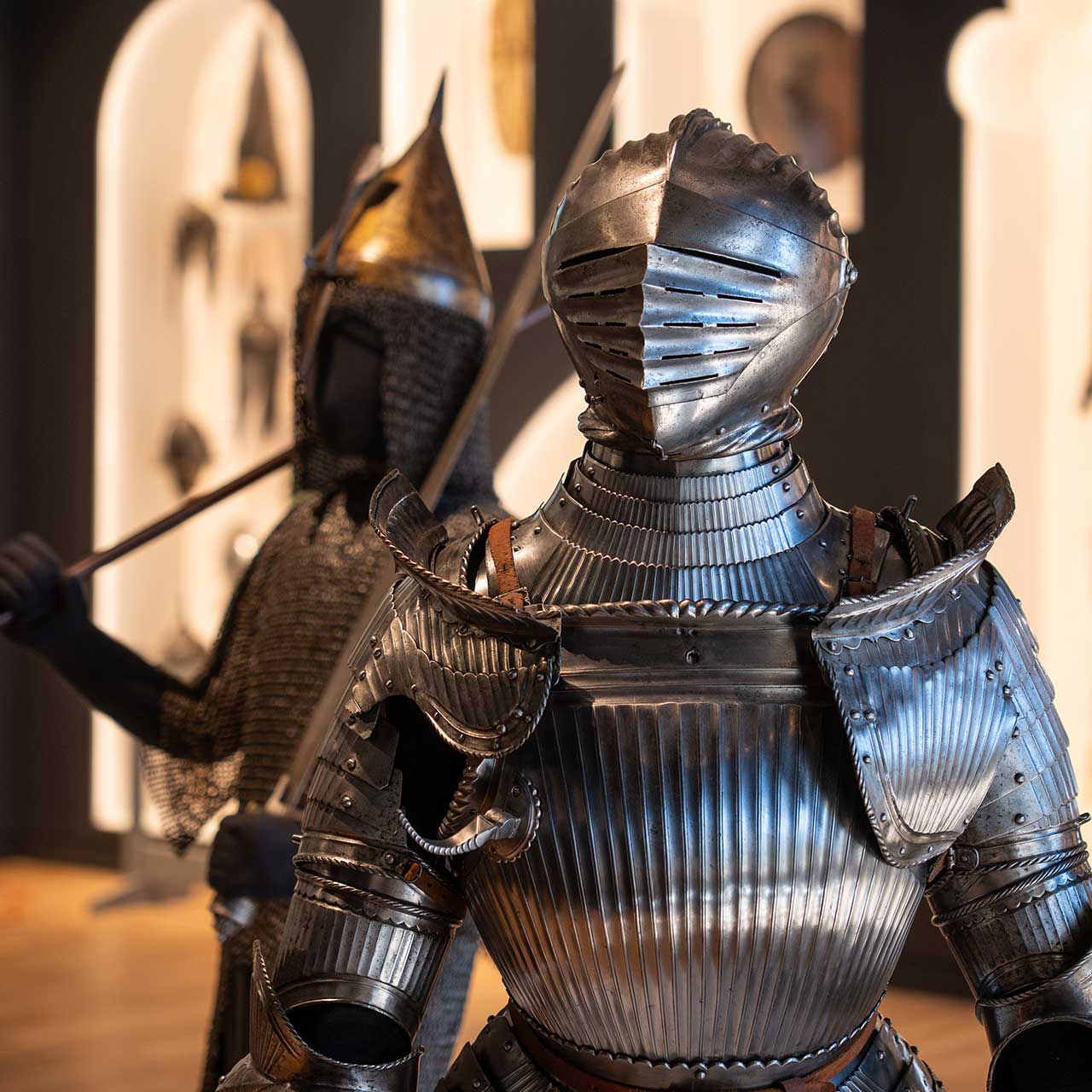 Suits of armor on display in the new Arms and Armor Galleries