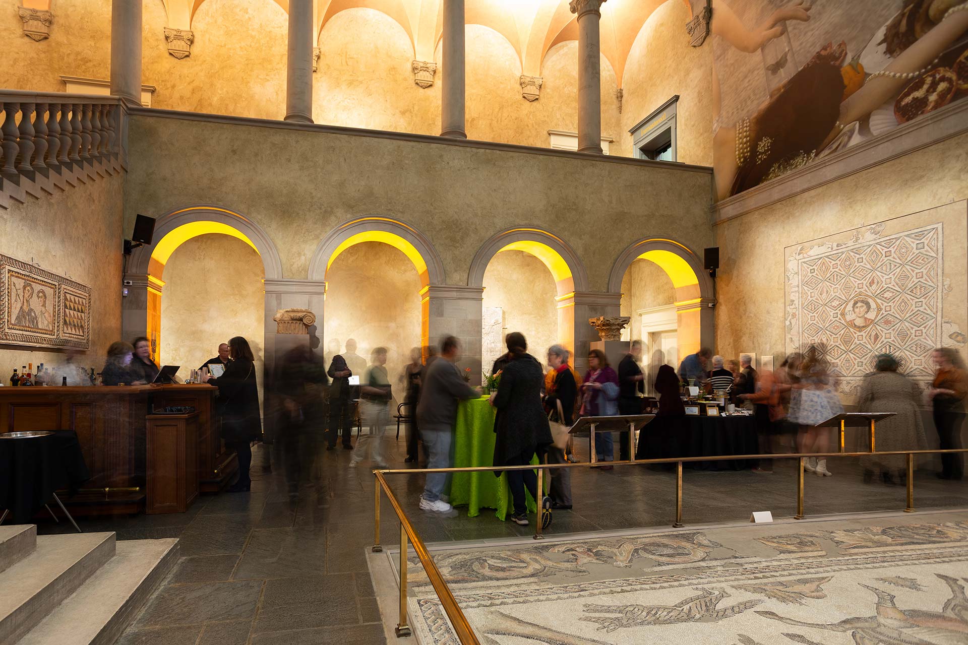 Guests gathered in Renaissance Court during an evening event