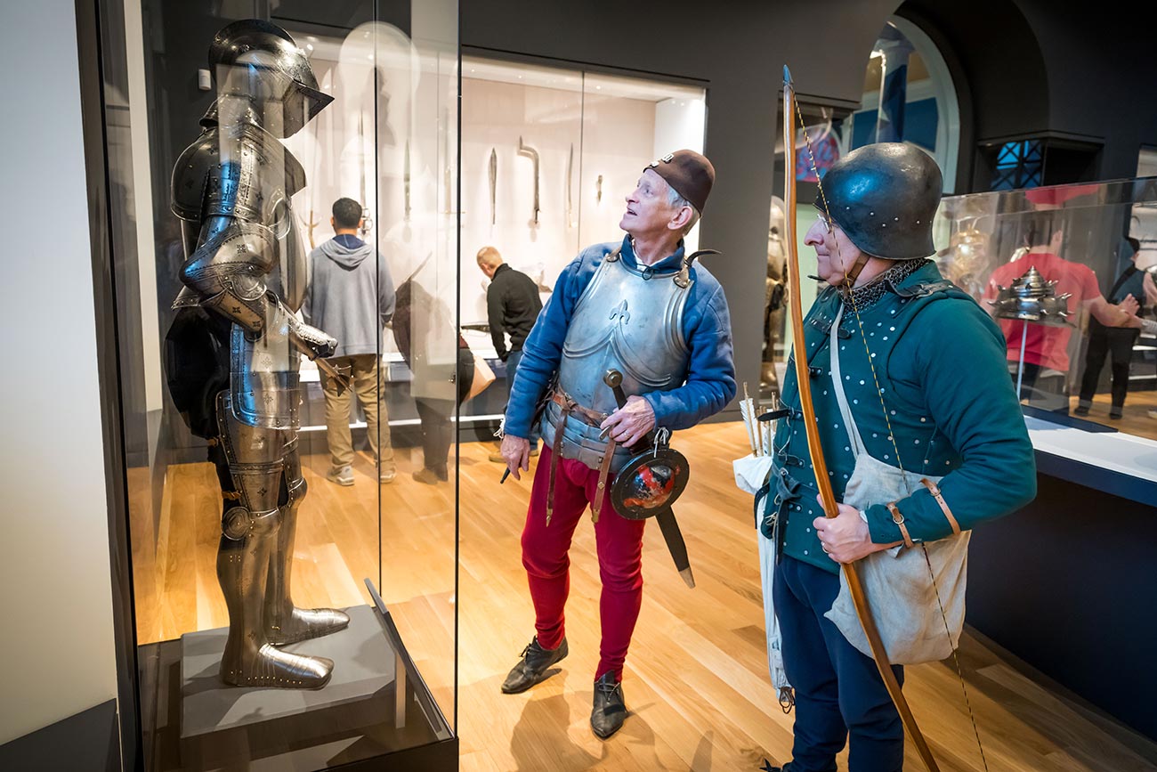 Medieval reenactors explore the Arms and Armor Galleries