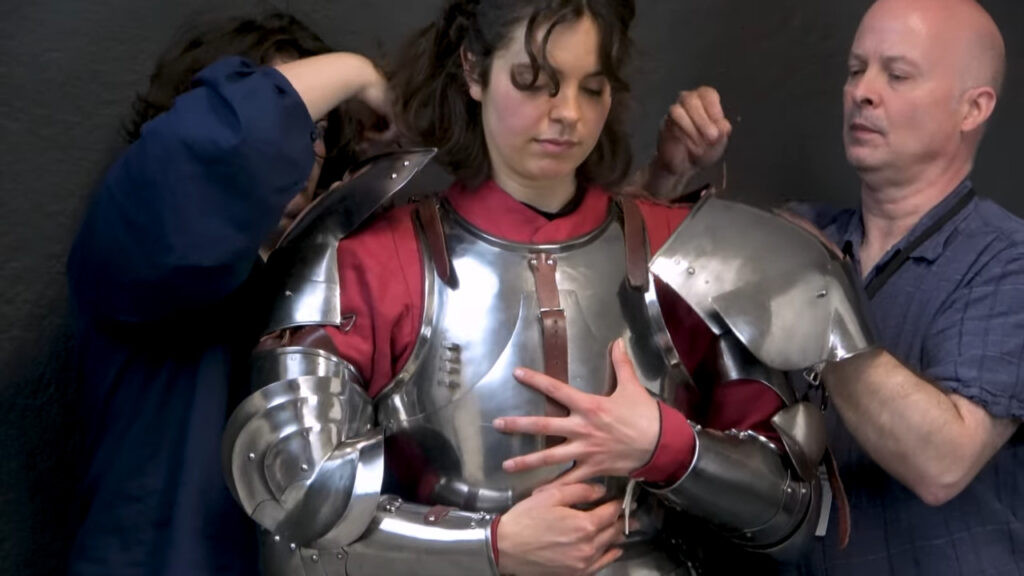 Plate armor suit-up in progress