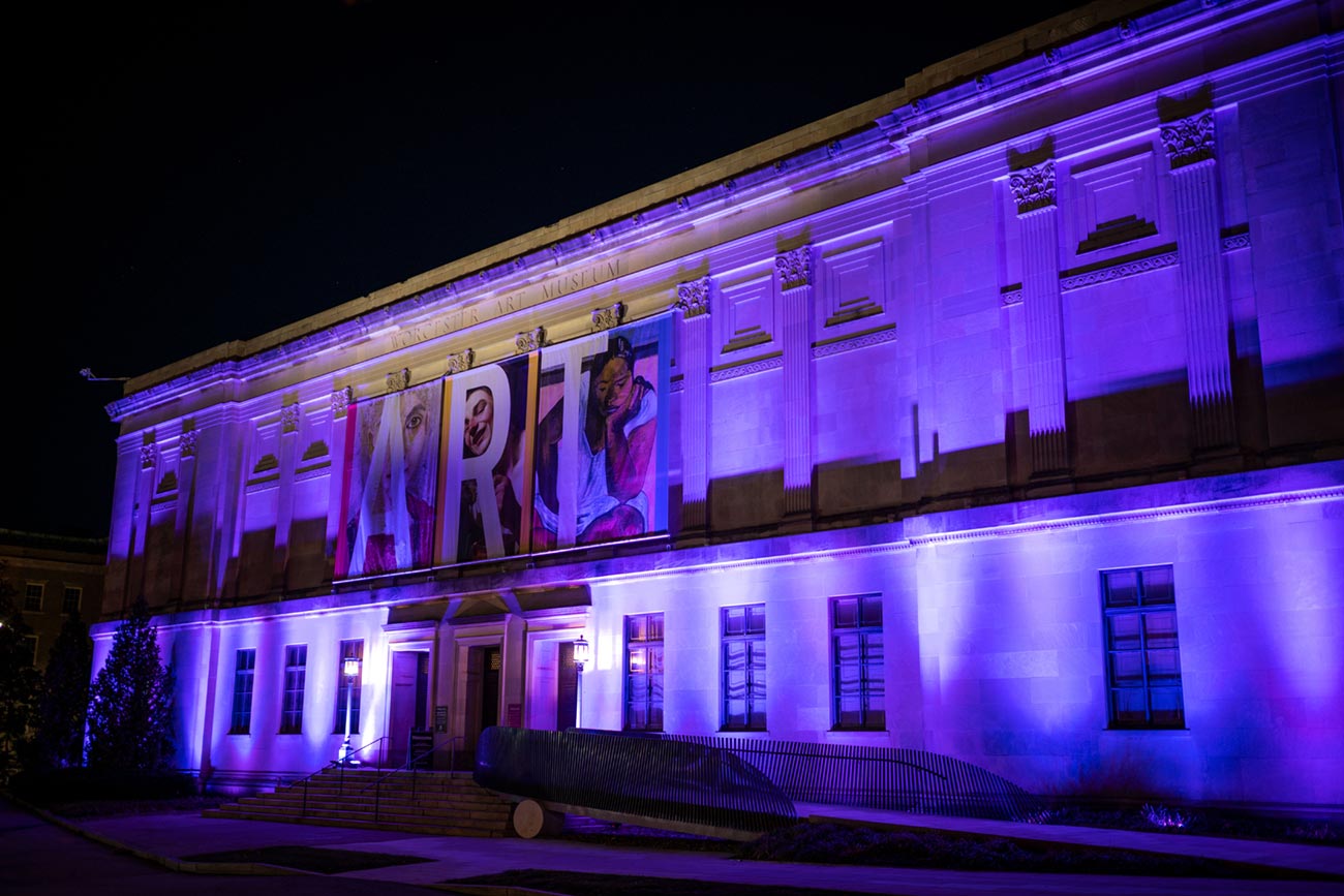 Worcester Art Museum facade at night with purple lighting effects